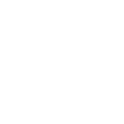 Messe Symbol wo zwei Menschen am Tisch gegenüber sitzen und über eine VR Entwicklung sprechen